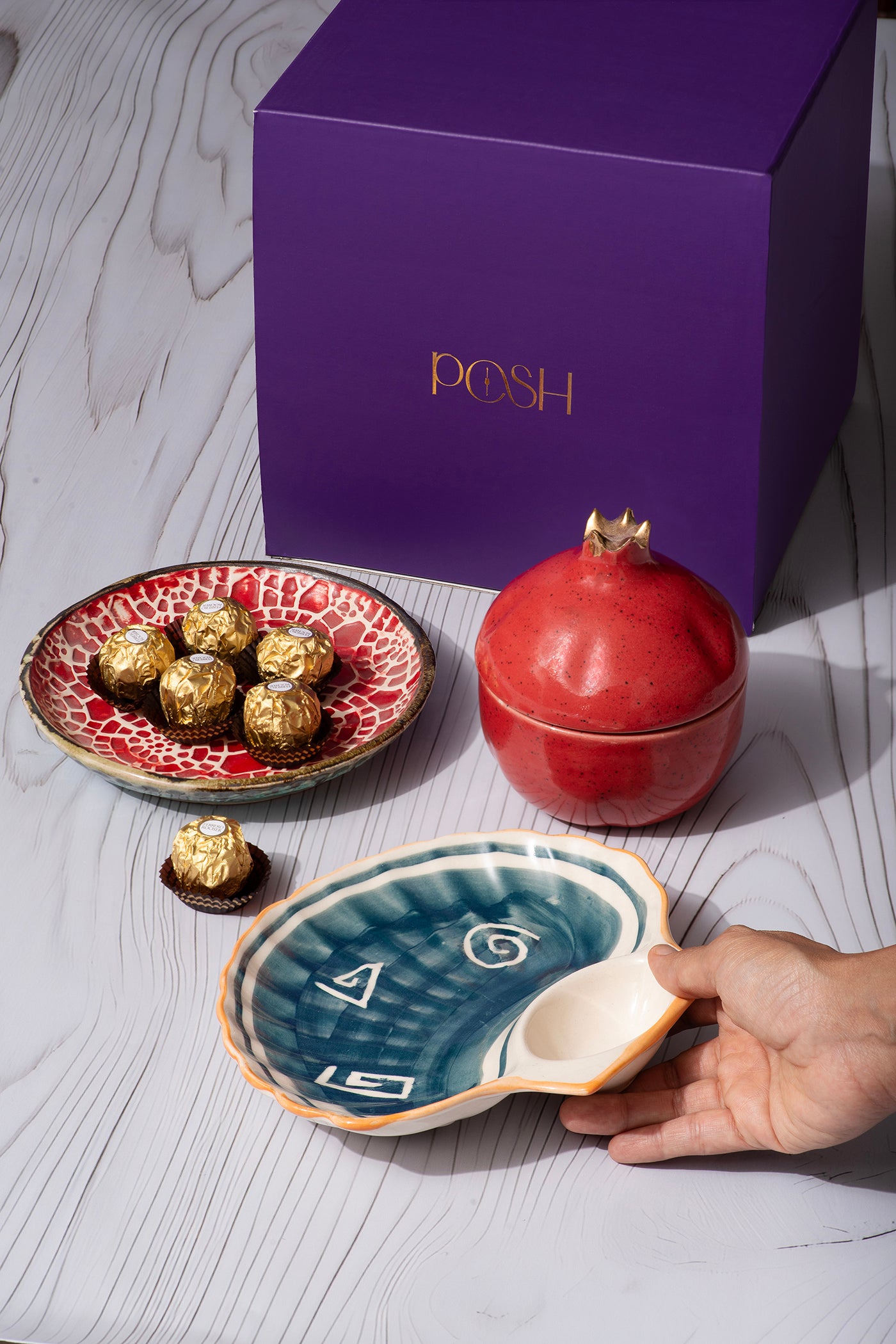 Rakhsha Bandhan Gift Hamper Red plate 
With 1 Red Pomegranate
& 1 shell platter